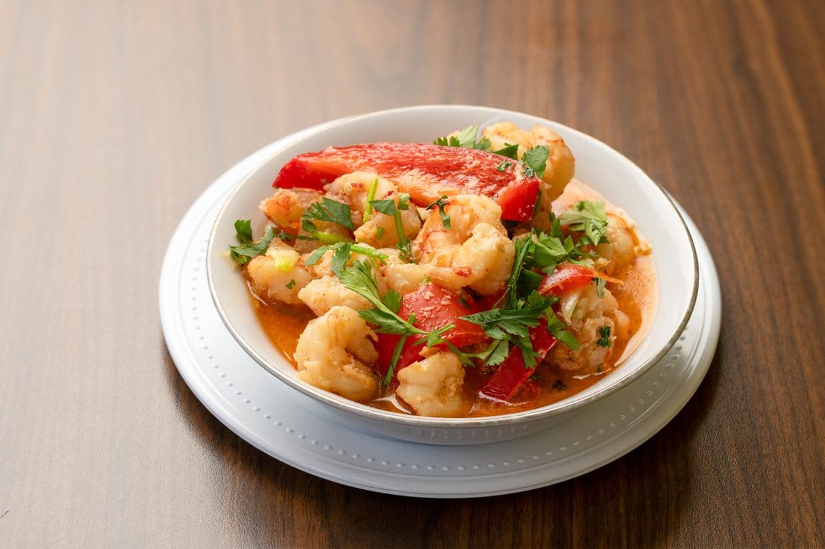 Latin hot food buffet with rice meats and traditional stews