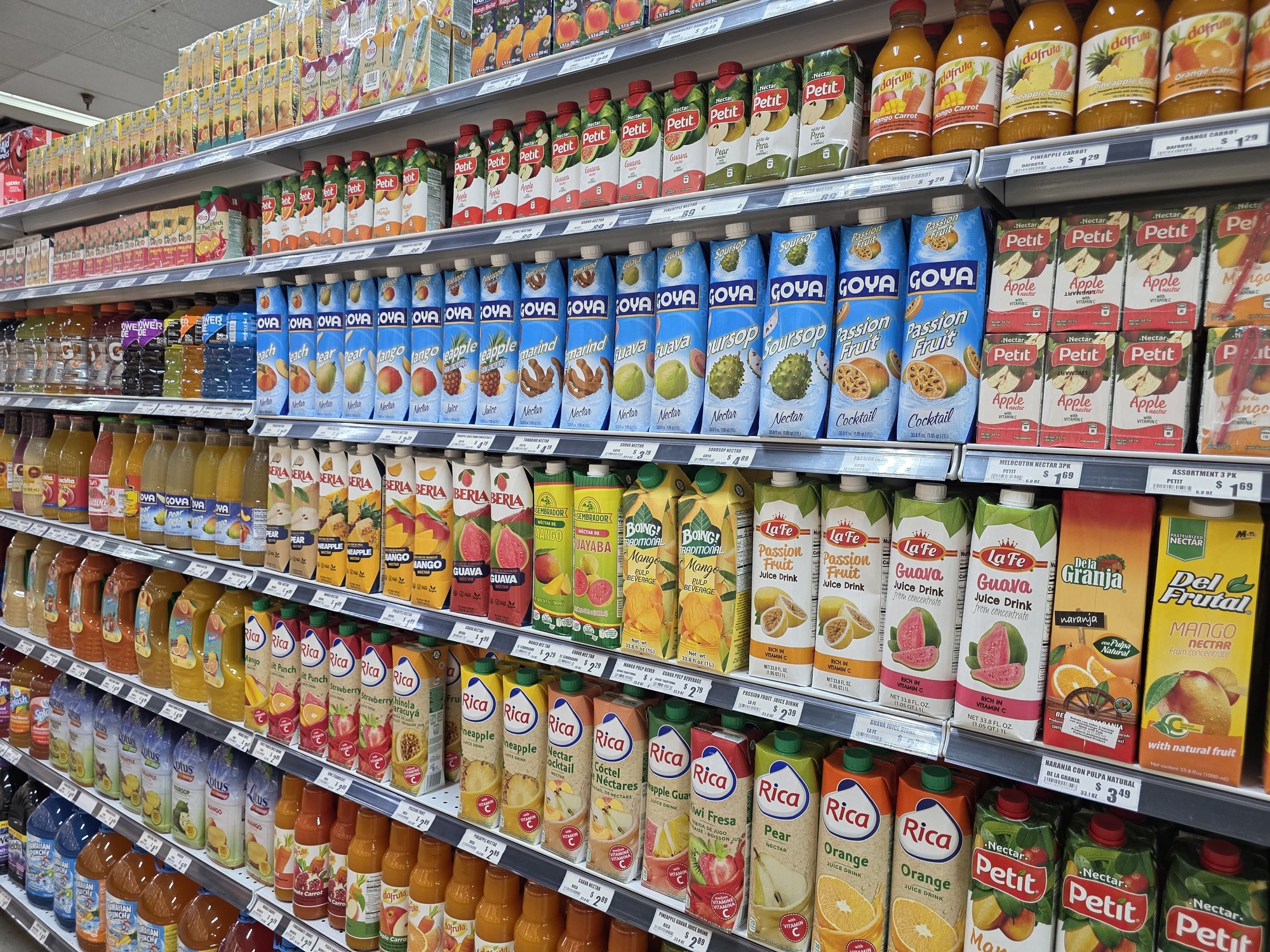Grocery shelves stocked with imported and local Latin products